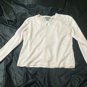 V neck pink sweater.